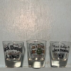 Three Jack Daniel's Shot Glass Each one is different.  Great for man cave decor